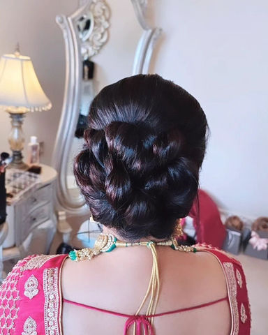 Asian Bride with elegant braided updo hairstyle