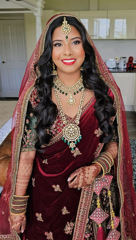 South Asian Bride in traditional attire with intricate jewellery