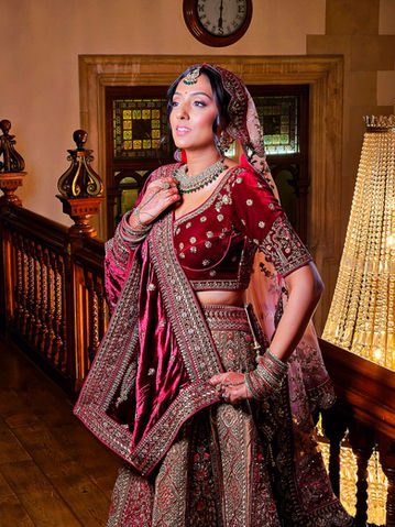 Asian Bride in ornate red traditional attire