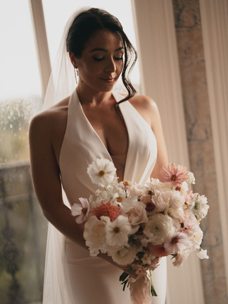 Bride holding wedding bouquet 