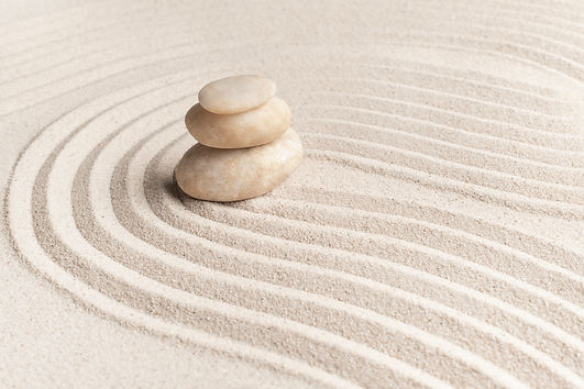 stacked-zen-marble-stones-sand-background-mindfulness-concept.jpg