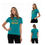 Thumbnail: Front, side, and back of a Woman in a studio with white backdrop modelling a dog mom shirt in teal with hiking graphics