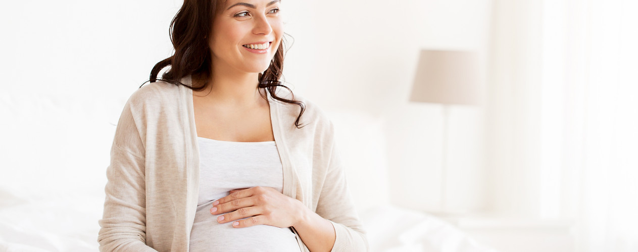 Pregnant Woman Smiling_edited.jpg