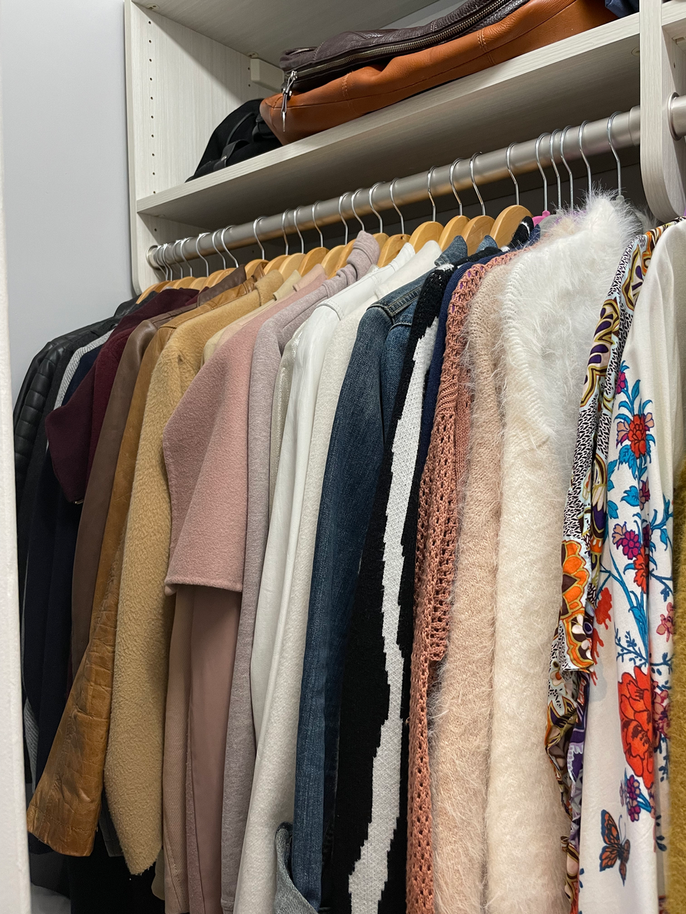 organized jackets in a reach in closet