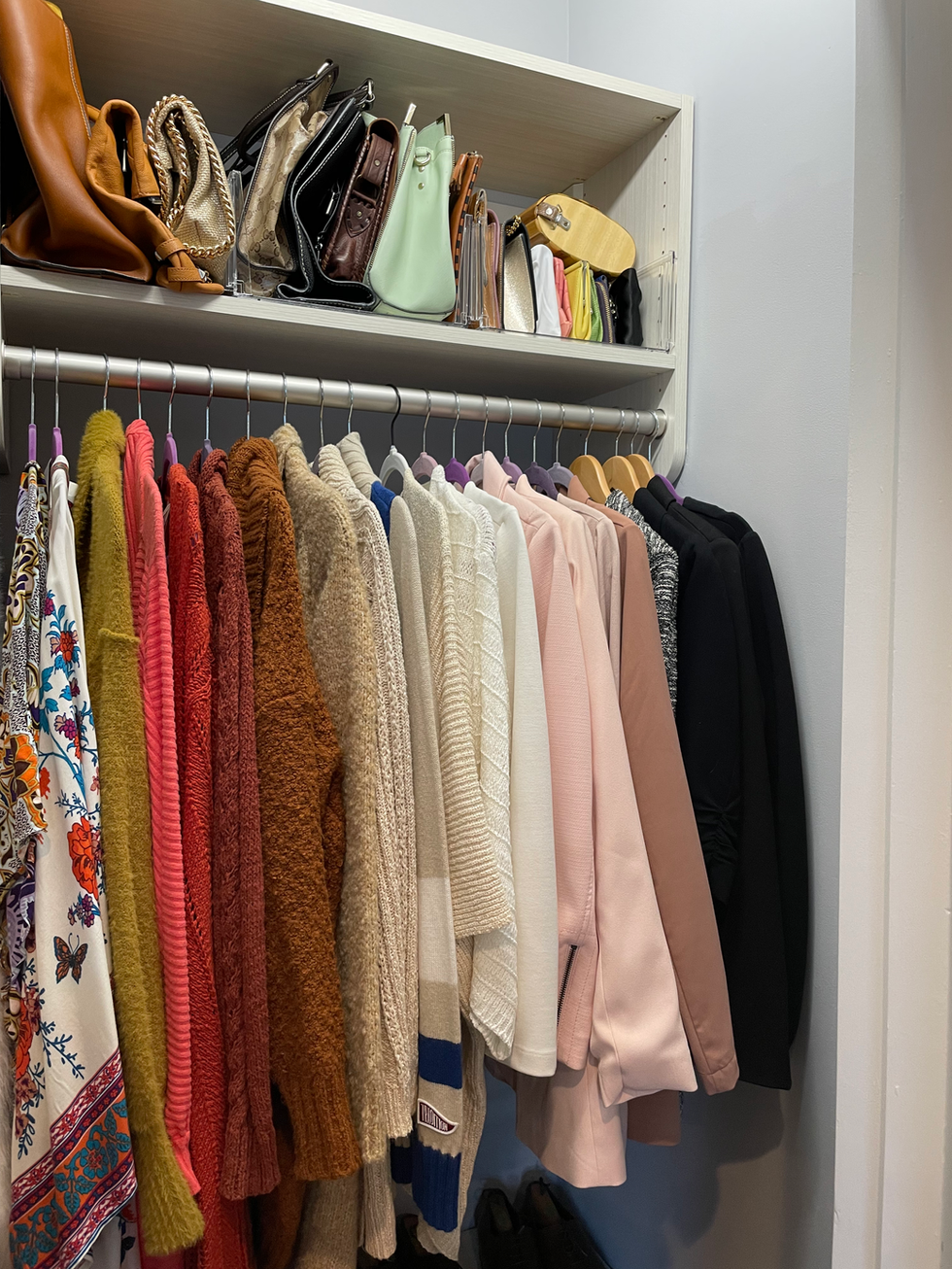 organized purses in closet