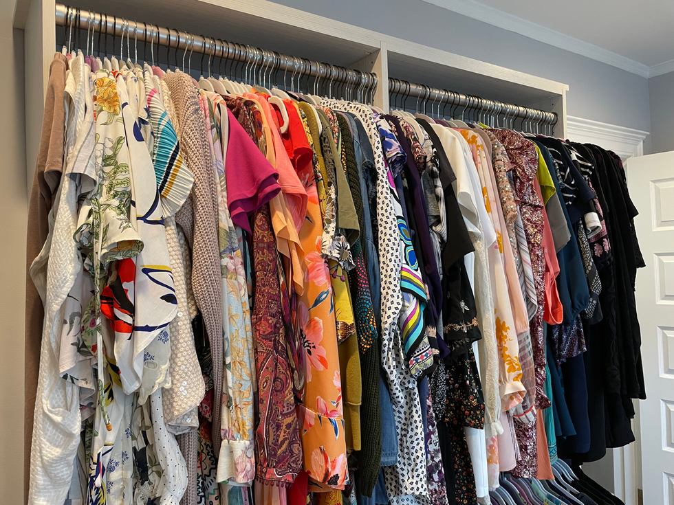 ladies clothes organized on hangers