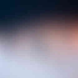 Naked skier slides down the slope on his knees, mouth wide open, and catches a load mid-run.