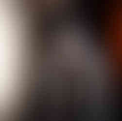 Young center boxing out under the basket, perfect defensive stance