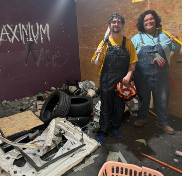 photo of brothers after a rage room session at Maximum Rage
