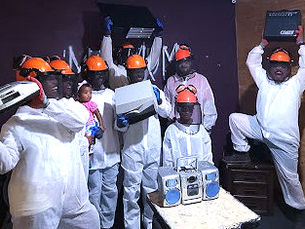 Rage and Paint Party Guests holding up radios for the radio themed party at Maximum Rage