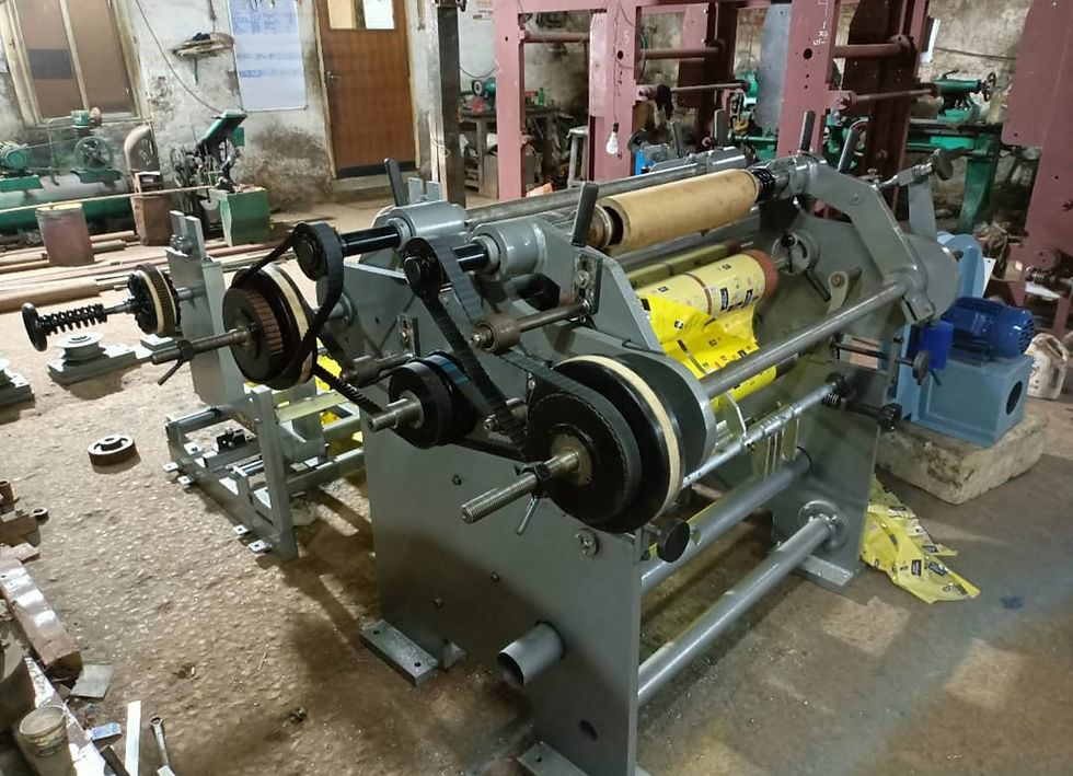 DRUM TYPE SLITTING CUM REWINDING MACHINE