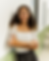 Professional headshot of Yari Ceballos, smiling with arms crossed, web designer and owner of Sheep of Faith.