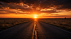 Sunset over a long road