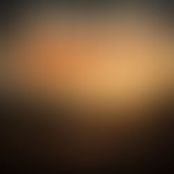 Boy stands on a hill over a village at sunset on an album cover reading AMAZING GRACE? with Curt Brickley text.