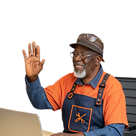 Smiling man in work apron waving during a video call