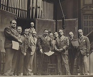 John McCormack (behind chair) with the choir and technicians at the recording studio for t