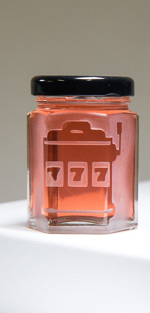 Thumbnail: Hand-carved jar filled with our gourmet Blush Chardonnay Jelly