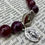 Thumbnail: Miraculous Medal and Immaculate Heart Garnet Rosary Beads Bracelet