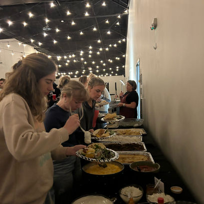 College age people getting free food at Creekside Church