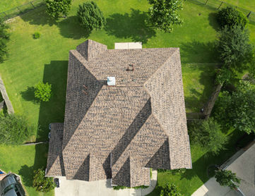 Garvin Exteriors IKO Dynasty Brownstone Shingle Roof Installation in Cypress Texas Cypress Creek Lakes