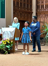 SCSL honors assembly - Mrs. Leamy standing with student