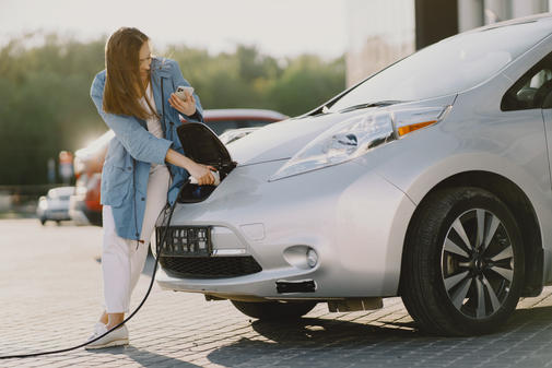 woman-charging-electro-car-at-the-electric-gas-station.jpeg