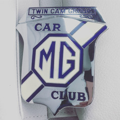 NOS Grille Badge