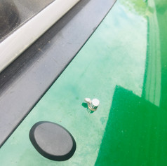 Windscreen wiper mechanism removed and holes blanked. VW T2 oval grommets
