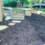 Image of Stone Stairs with Integrated Garden Features Beside a Lake