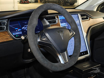 2017 Tesla Model X wrapped with dark grey perforated Alcantara with black stitching 