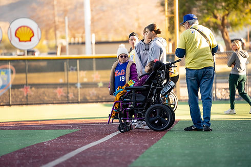 Miracle League of Arizona player in wheel chair on first base