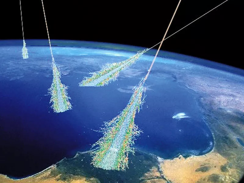 Artist conception of showers of cosmic rays passing through Earth's atmosphere