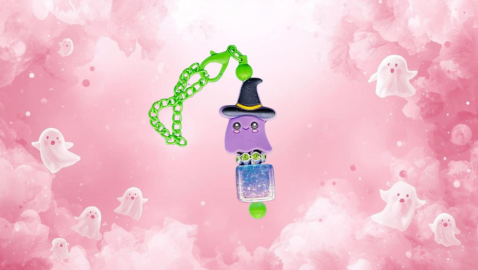 A purple ghost in a witch's hat with a sparkling charm and vibrant green chain. Perfect for Halloween tumbler accessories.
