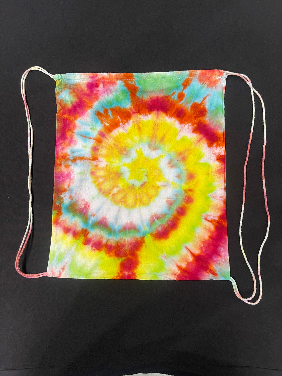 Frontside yellow and red spiral drawstring bag