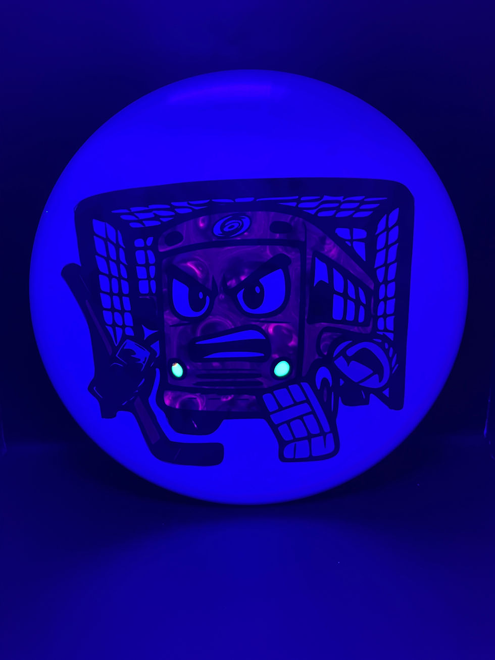 Frontside Bussi Goalie in Net Zone under blacklight