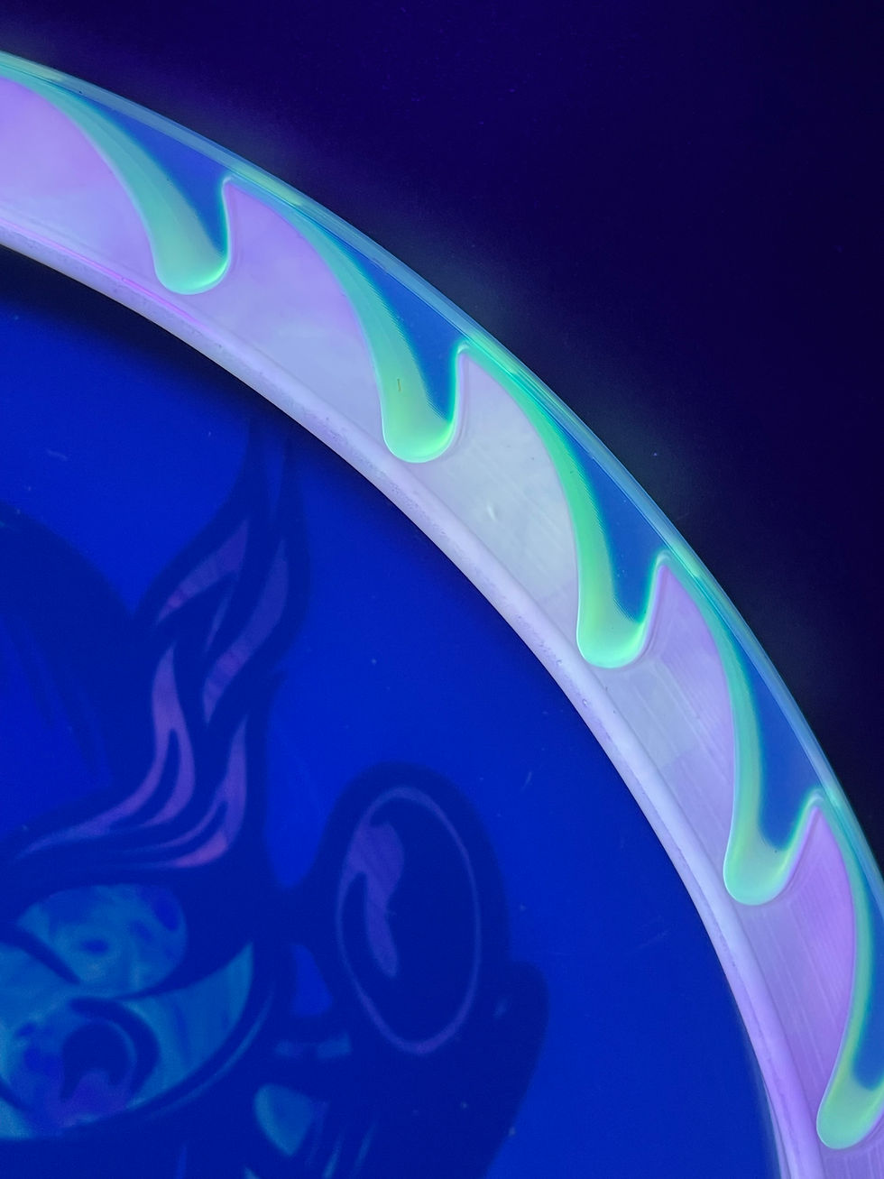Thumbnail: Close-Up Backside Buzzz Saw under blacklight