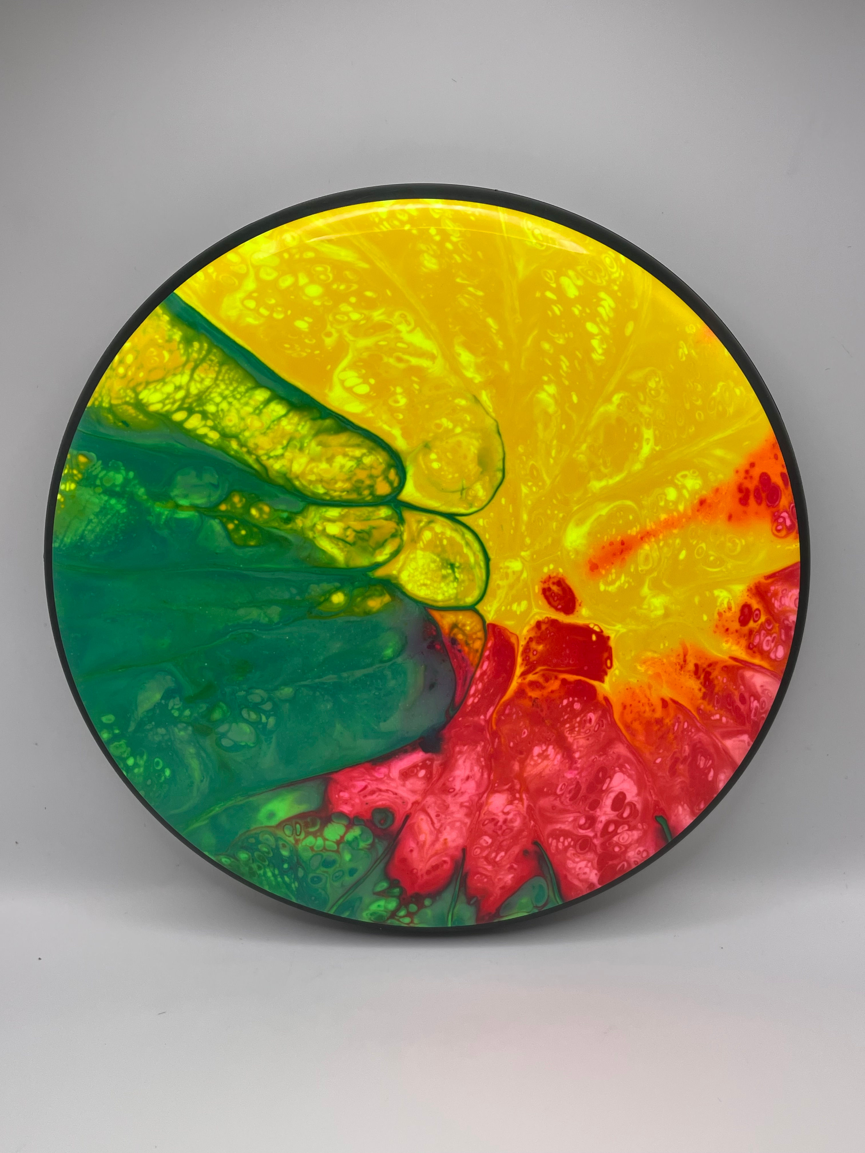 Frontside Reddish Pink, Green and Yellow Spiral Glitch