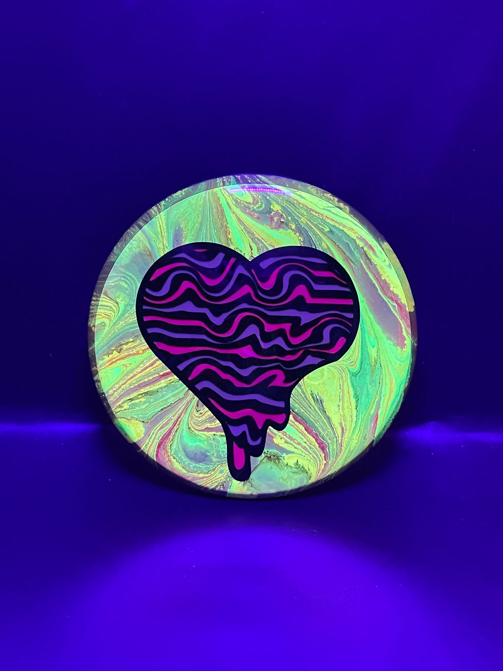 Frontside Wavy Striped Heart Mini under blacklight
