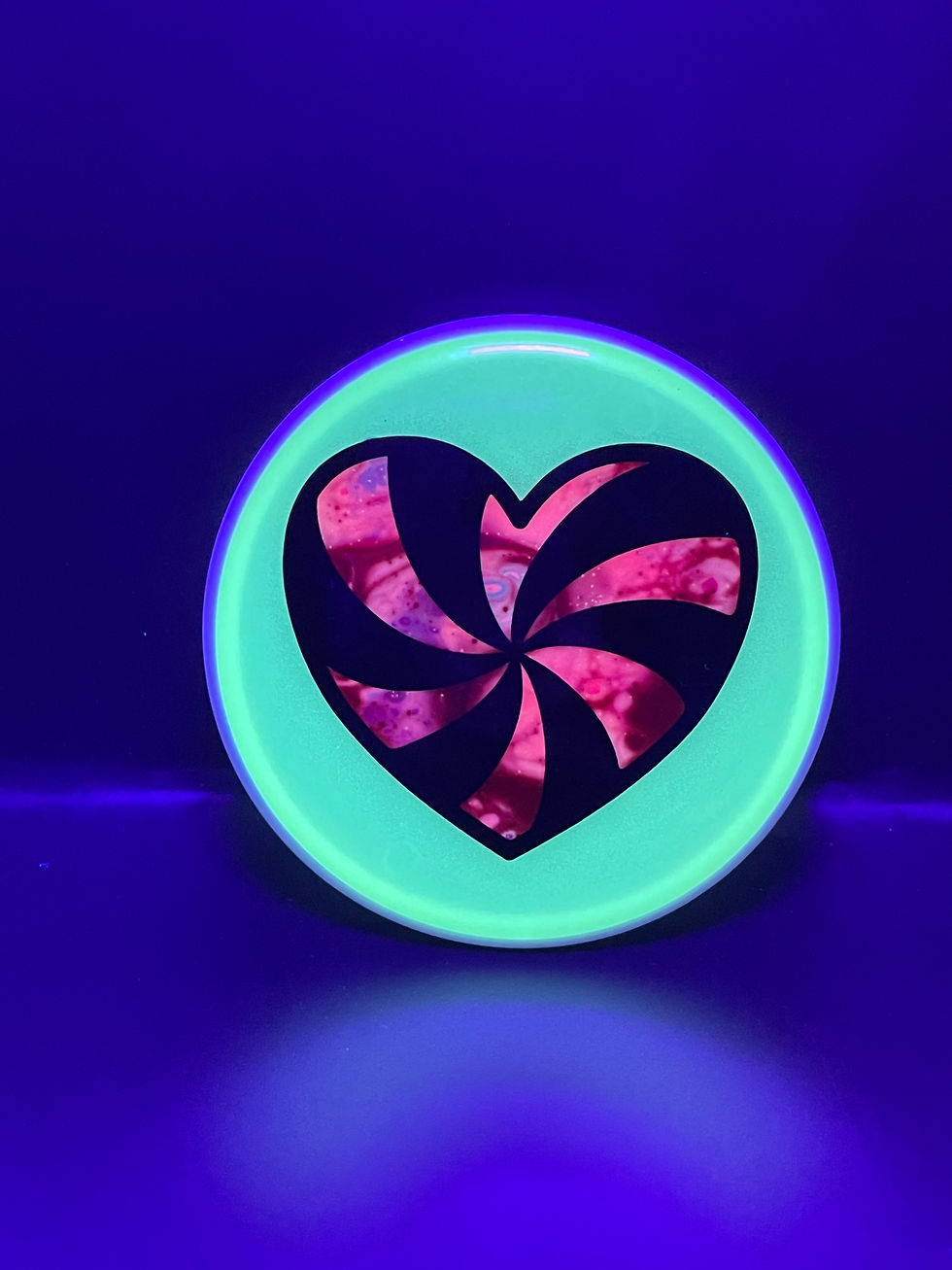 Frontside Red and Magenta Striped Heart Mini under blacklight