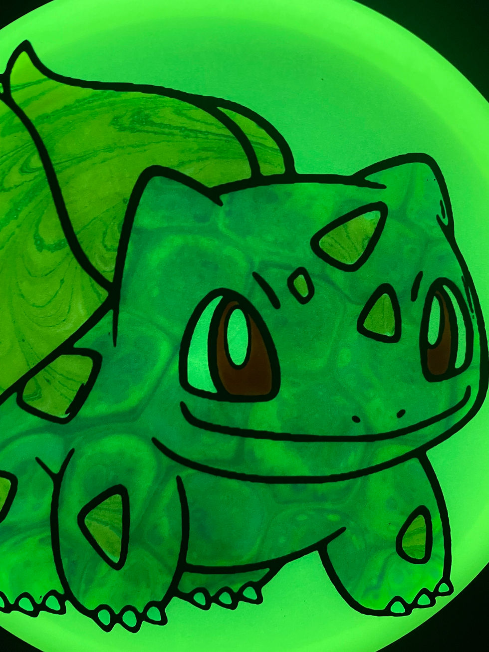 Thumbnail: Close-Up Frontside Green and Yellow Bulbasaur Pokemon Mako3 glowing after blacklight charge