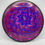 Thumbnail: A purple and pink flower.