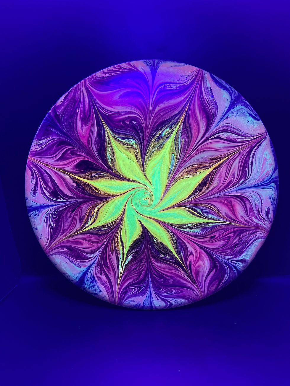 Frontside Red and Yellow Spiral Hex under blacklight