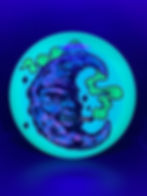 Frontside Smoking Magenta and Blue Crescent Moon Mamba under blacklight