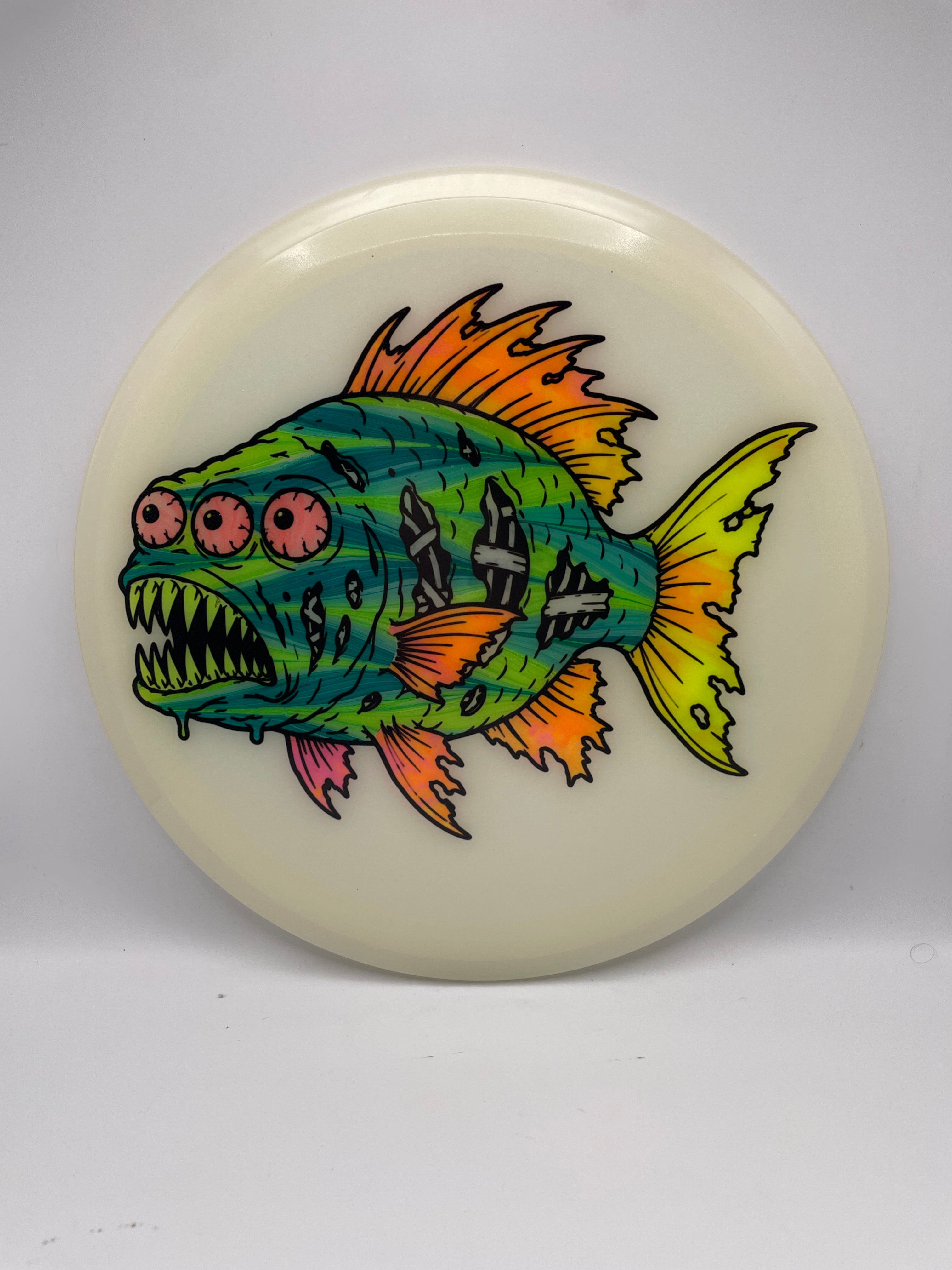 Green and Orange Alien Fish Crave