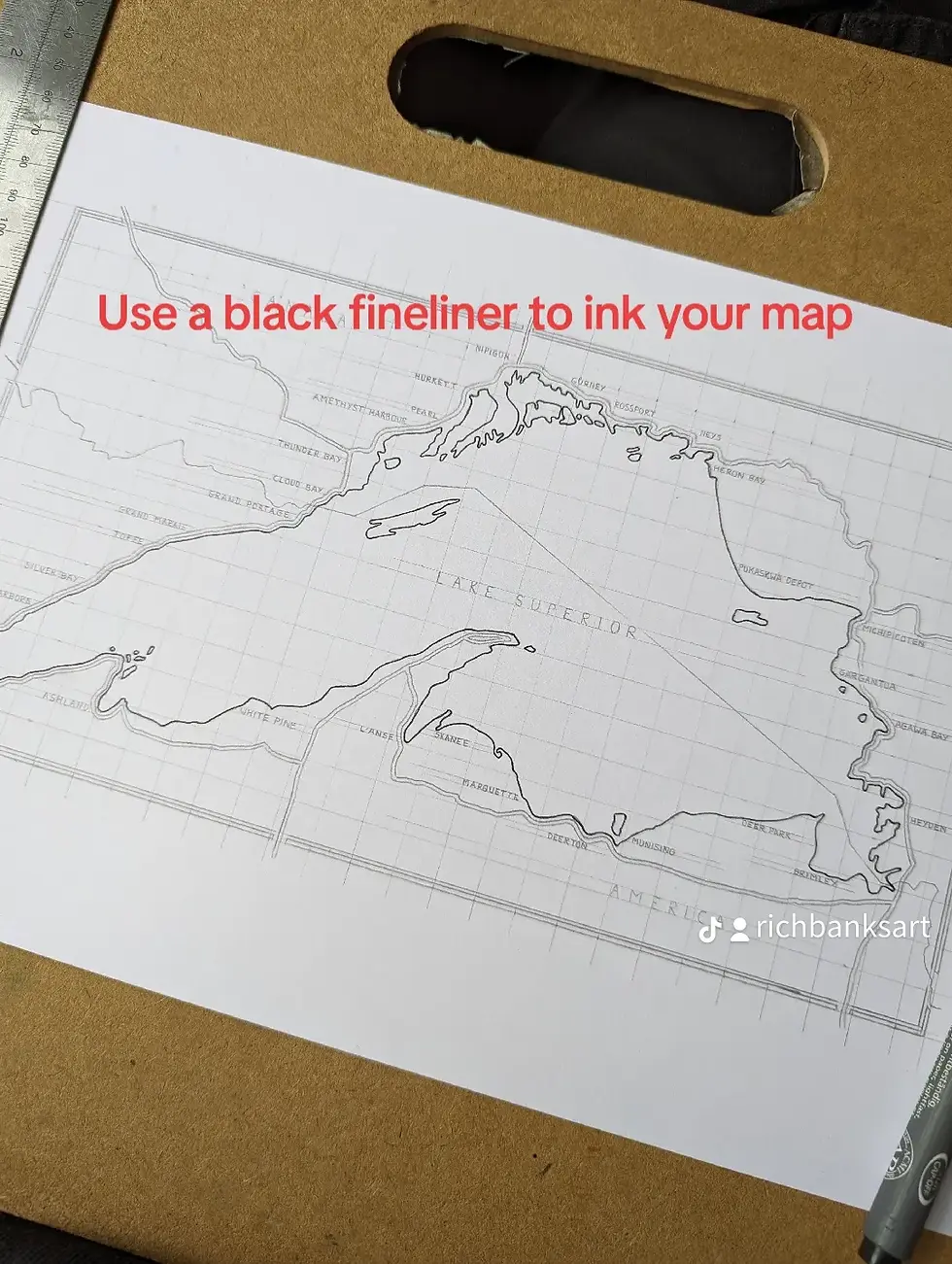 Use a black fineliner to ink your map
