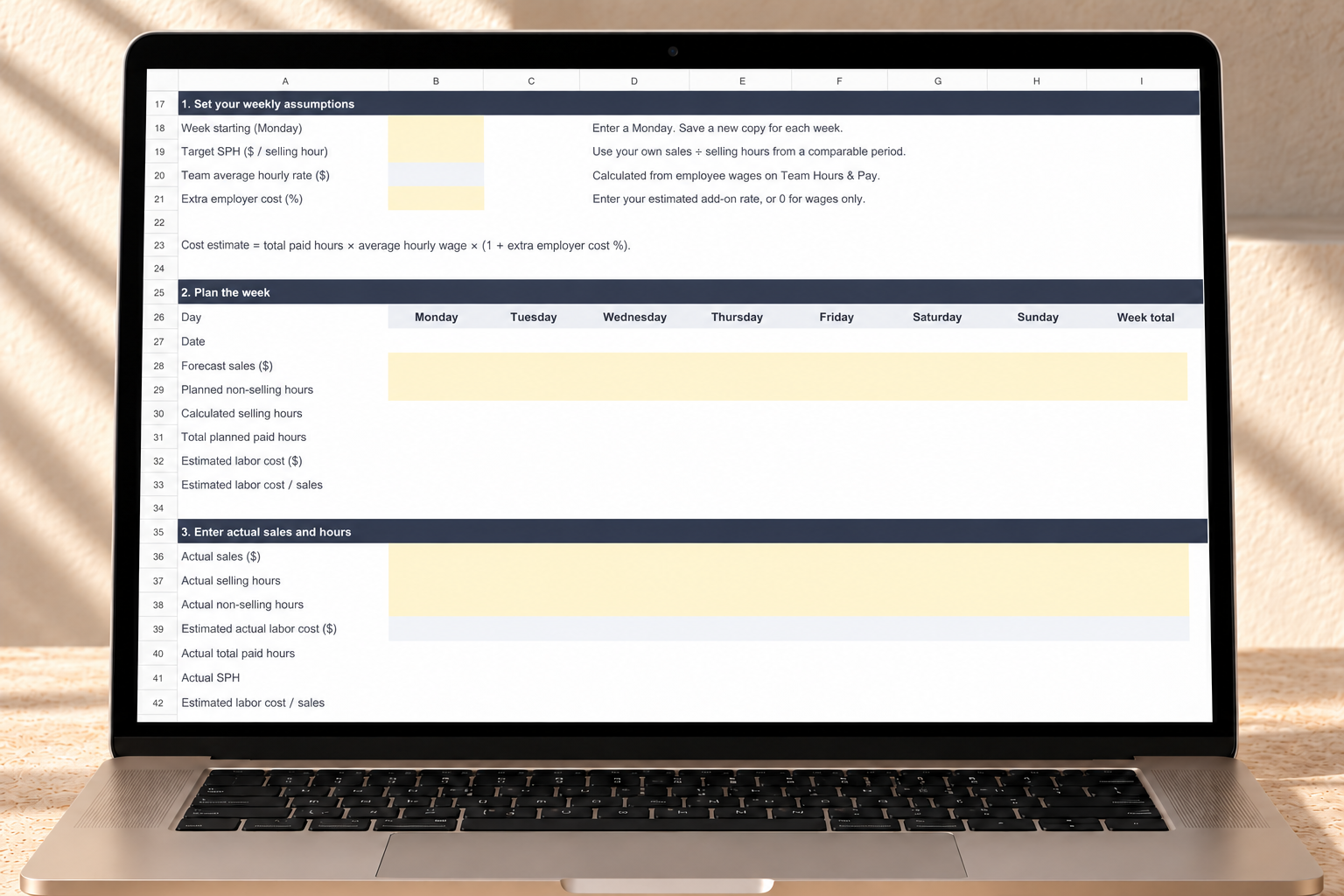 Holiday Retail Readiness Bundle worksheet displayed on a laptop in a warm neutral workspace