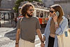 lovely-tourist-couple-holding-hands-while-walking-2026-03-10-01-08-56-utc.jpg