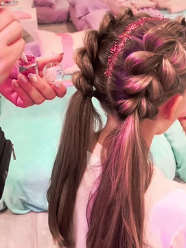 Glitter and pink colored french braided hair