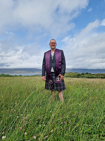 Andrew standing in front on an Isle of Skye scenery