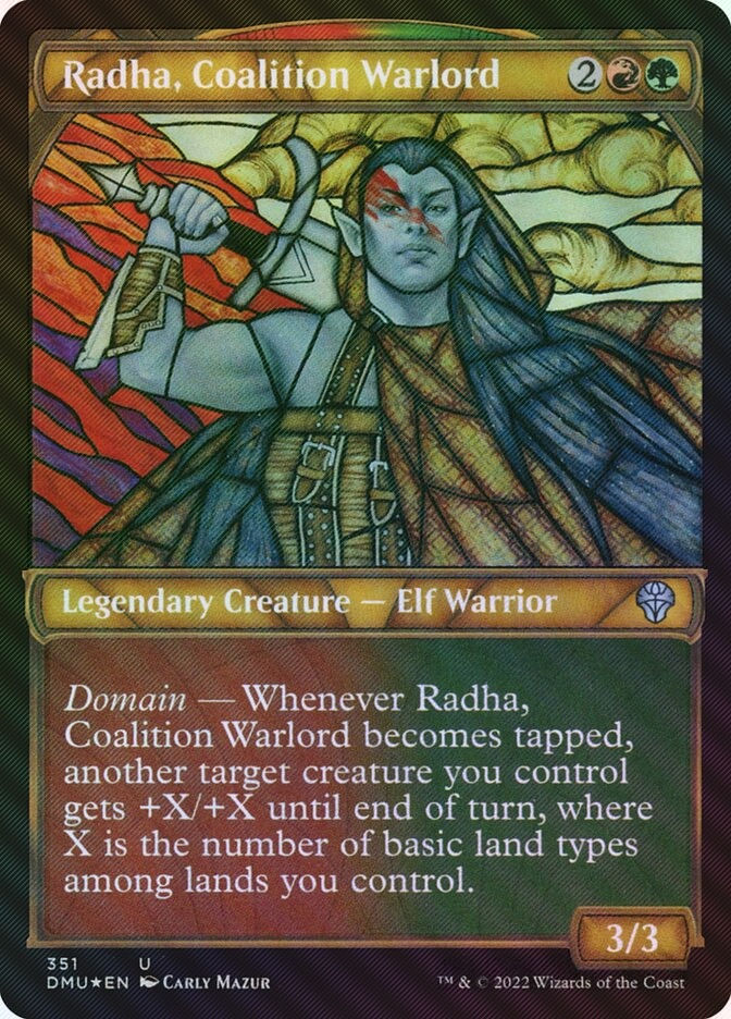 Radha, Coalition Warlord (DMU) (351) / Showcase / Textured Foil